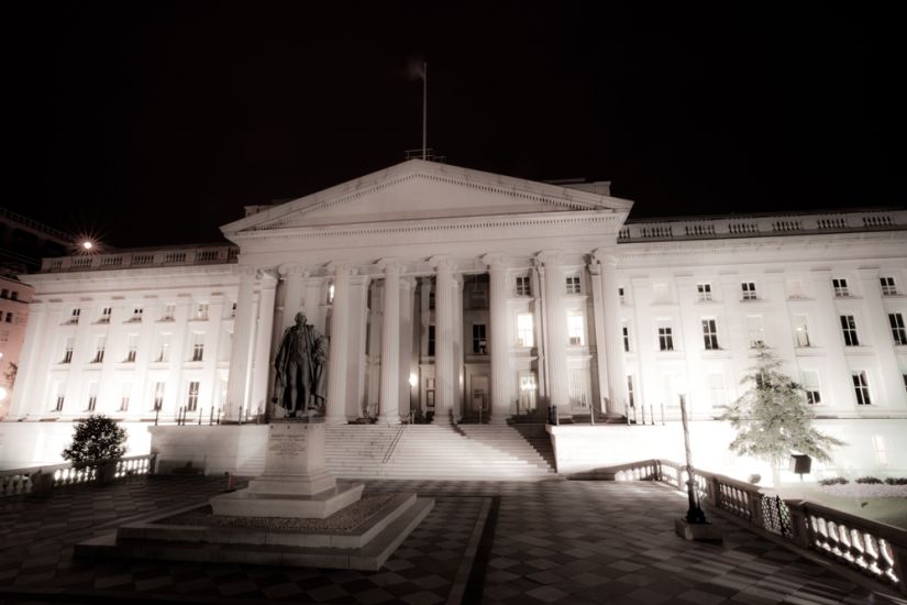 The United States Treasury Department at night where real currency is printed.